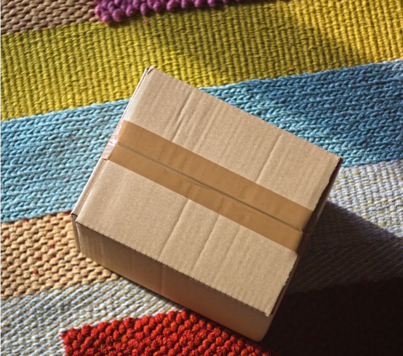 Packaged order on a woven rug